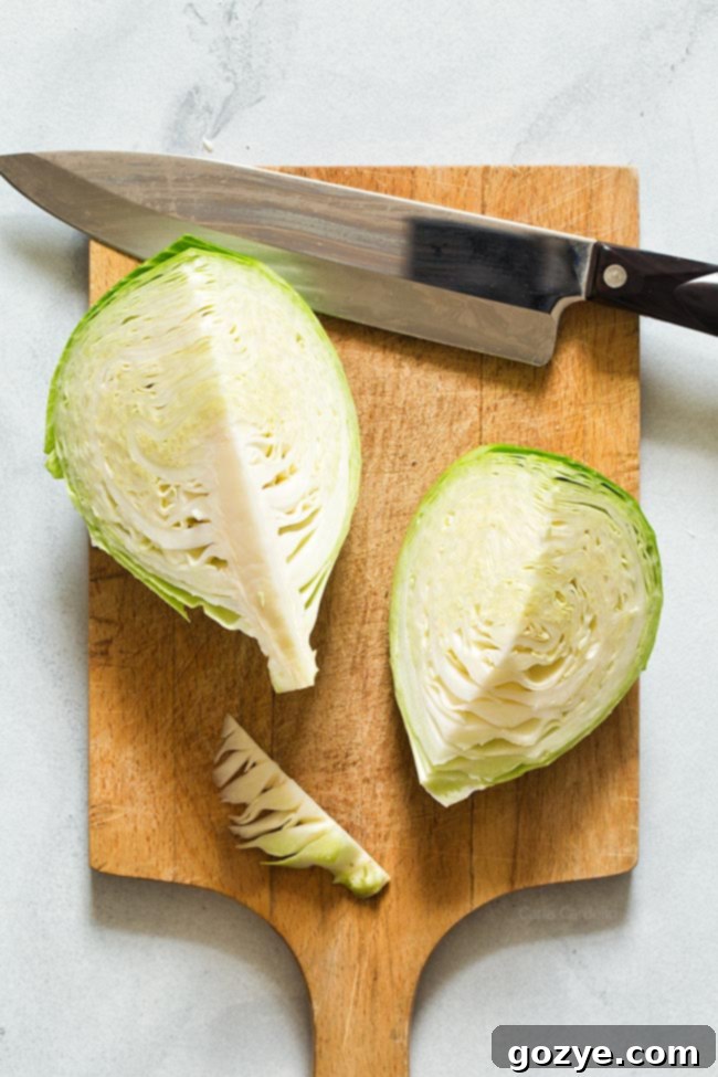 Cut each cabbage half in quarters