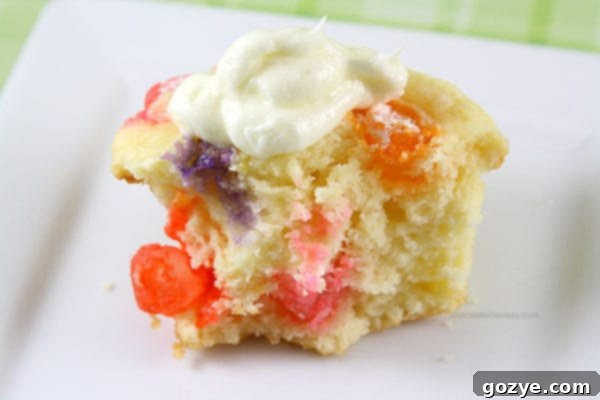 Array of finished Jelly Bean Cupcakes on a cooling rack ready for serving