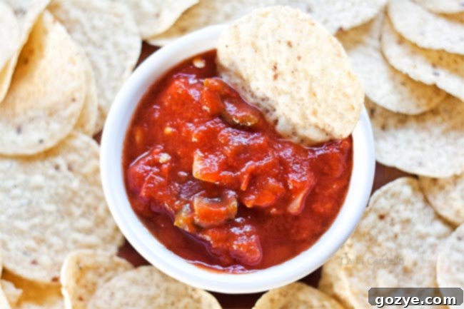 White bowl with red salsa