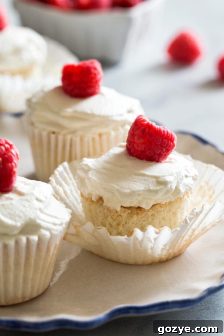 Light and airy homemade Angel Food Cupcakes, a perfect treat using two egg whites and baked in a muffin pan.