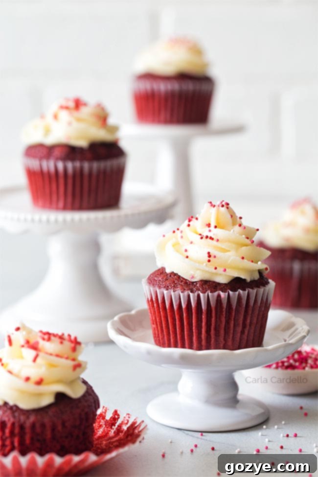 Small Batch Red Velvet Cupcakes on mini cake stands, perfectly frosted