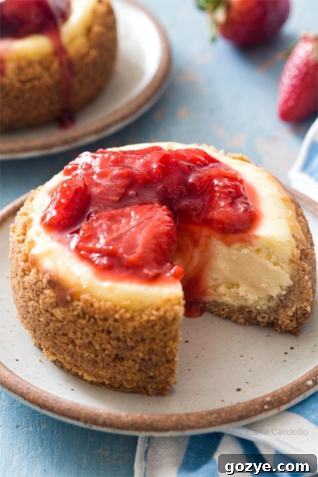 Delicious 4-inch cheesecake, perfect for sharing or a personal treat.