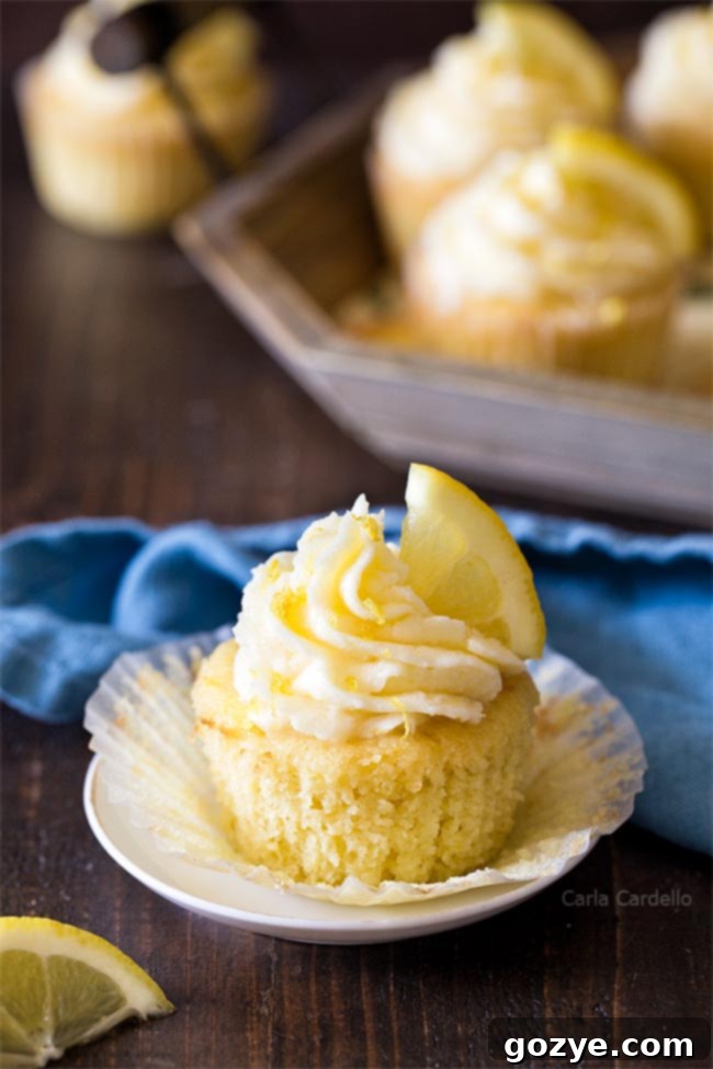 Easy Small Batch Lemon Cupcakes 3 Five small batch lemon cupcakes arranged artfully on a serving tray, ready to be enjoyed, showcasing their inviting texture and frosting.