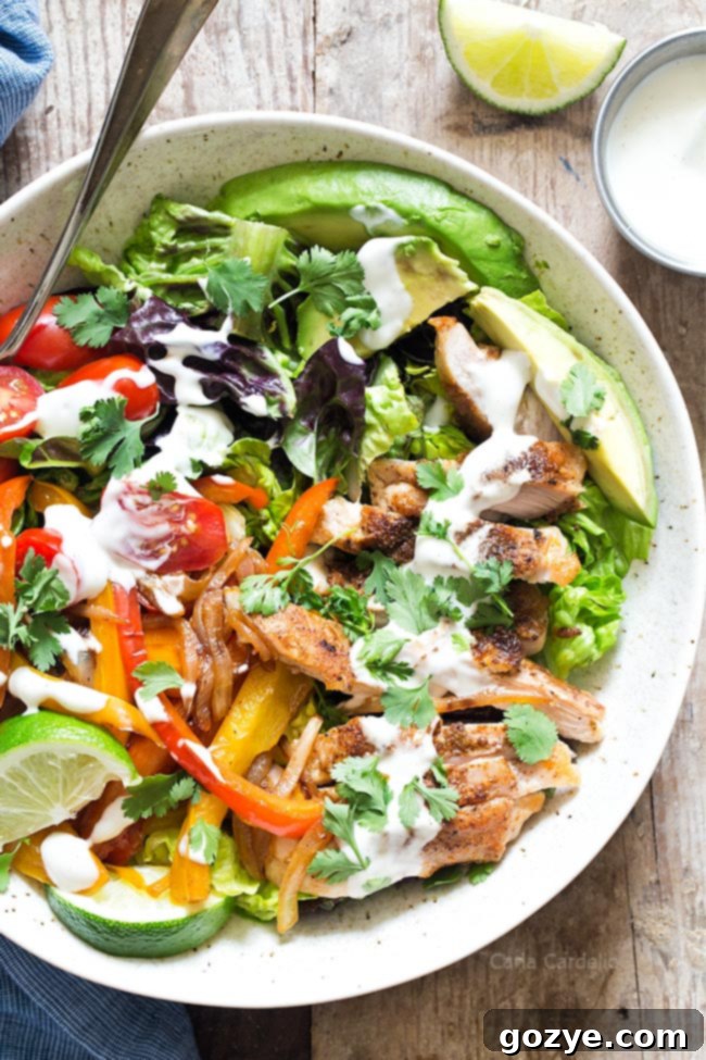 Close up of Chicken Fajita Salad, showing the textures of the ingredients