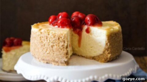 6 Inch Cheesecake topped with cherry pie filling