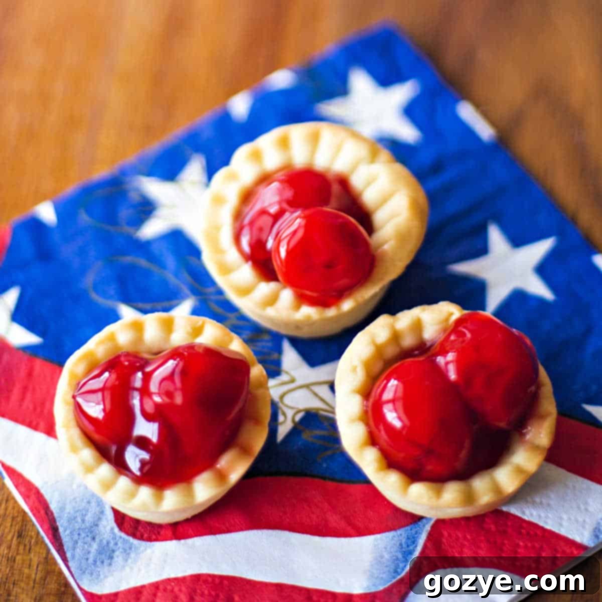 Bite-Size Cherry Tartlets arranged on a serving plate