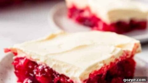 Cherry Pineapple Jello Salad in a glass dish