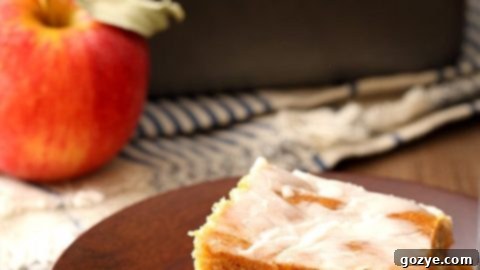 Moist Apple Fritter Cake with a sweet glaze, mimicking the flavors of a fried fritter