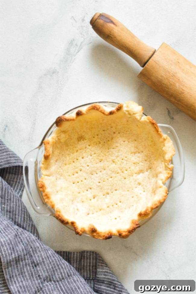 Golden brown baked pie crust, ready for filling