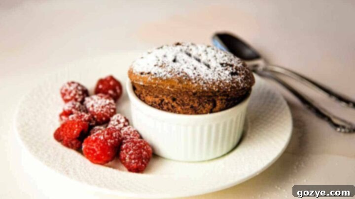 Chocolate Soufflé Recipe for Two, light and airy, topped with Kahlua whipped cream.