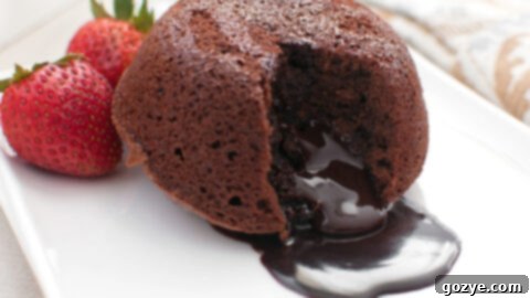 Instant Pot Lava Cake with a molten chocolate center and berries.