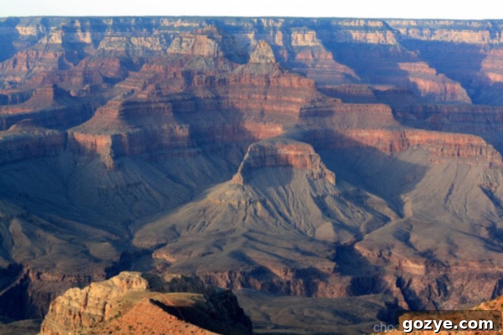 IMG_3635 A breathtaking panoramic view of the Grand Canyon, showcasing its immense scale and geological layers.