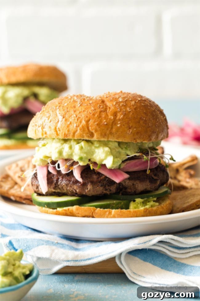 Avocado burger on white plate 
