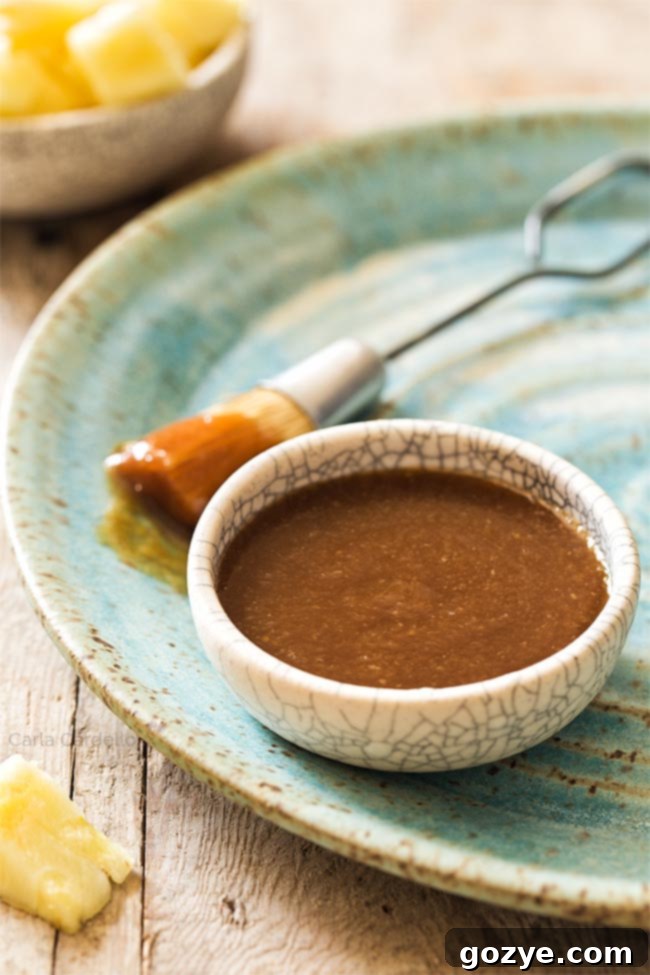 Pineapple teriyaki sauce in a bowl on a plate