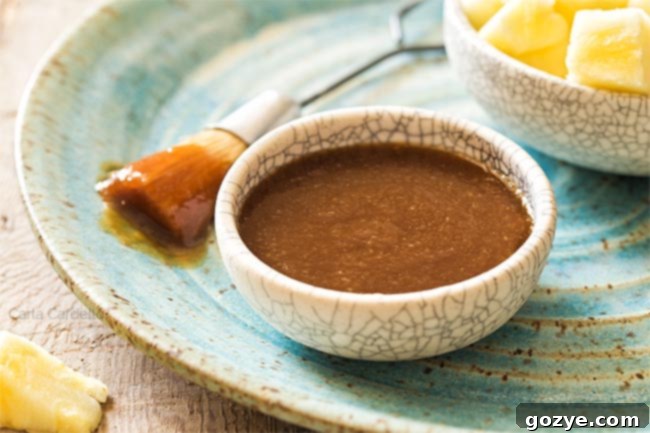 Pineapple teriyaki sauce in a bowl on a plate