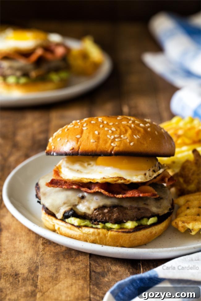 Sunrise Burger 4 Fried egg burger with yolk in tact and ready to be broken