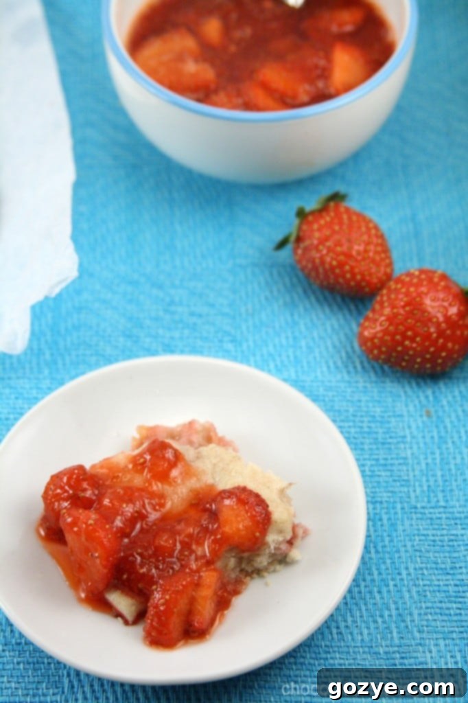 Golden brown Strawberry Cream Biscuits cooling on a wire rack, steam gently rising