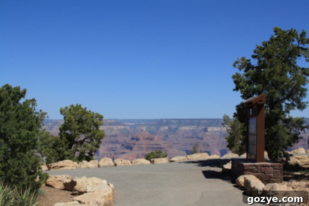 A water filling station with a sign, located at one of the Grand Canyon's main viewpoints.