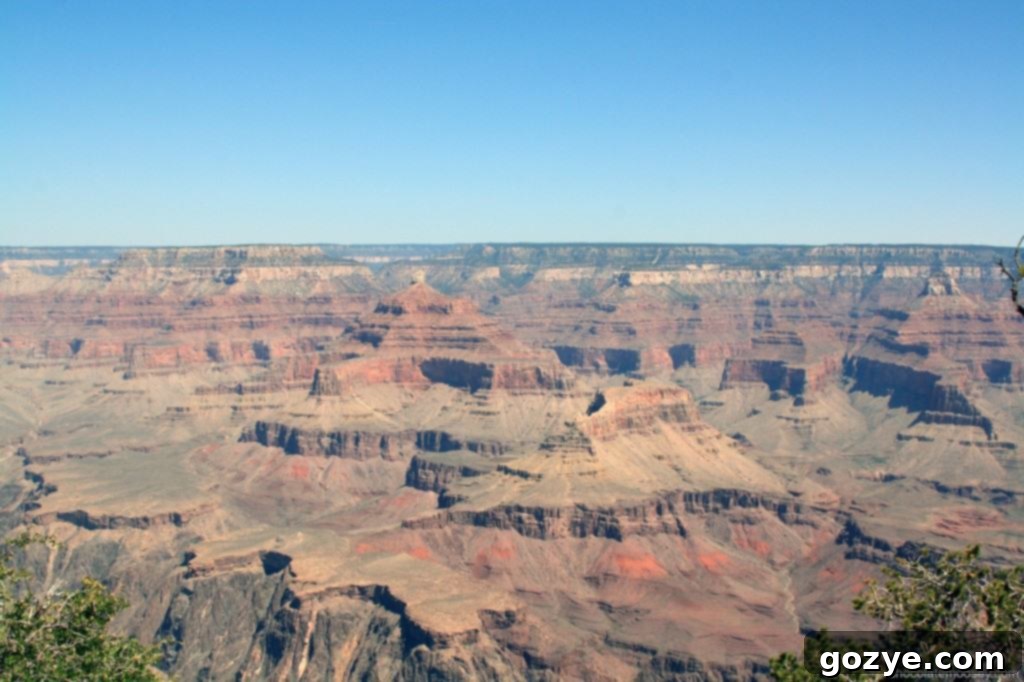 A vast expanse of the Grand Canyon, showing its immense depth and vibrant colors.