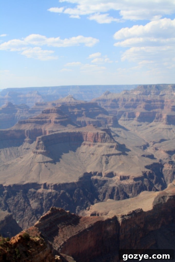 A closer look at the canyon walls, revealing ancient rock layers.