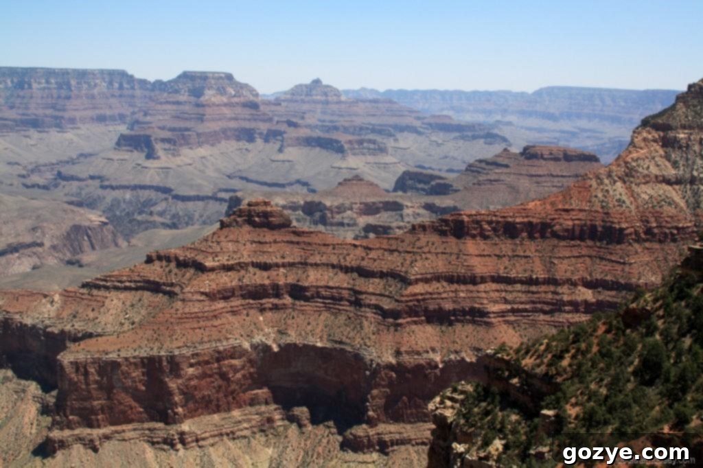 A wider view of the canyon, with a subtle haze in the distance.