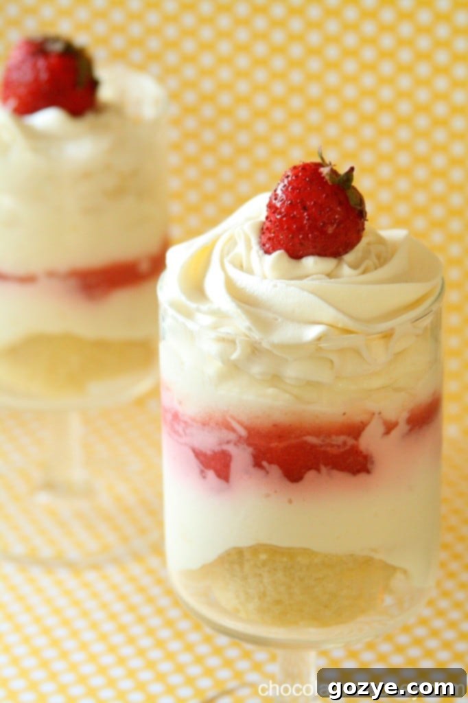 Beautifully layered Strawberry Cheesecake Parfaits in elegant glasses, ready to serve