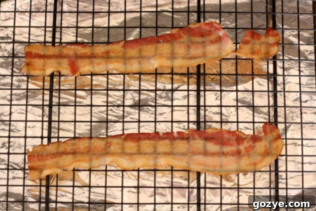 Close-up of a perfectly baked Bacon and Dried Cherry Chocolate Chip Cookie