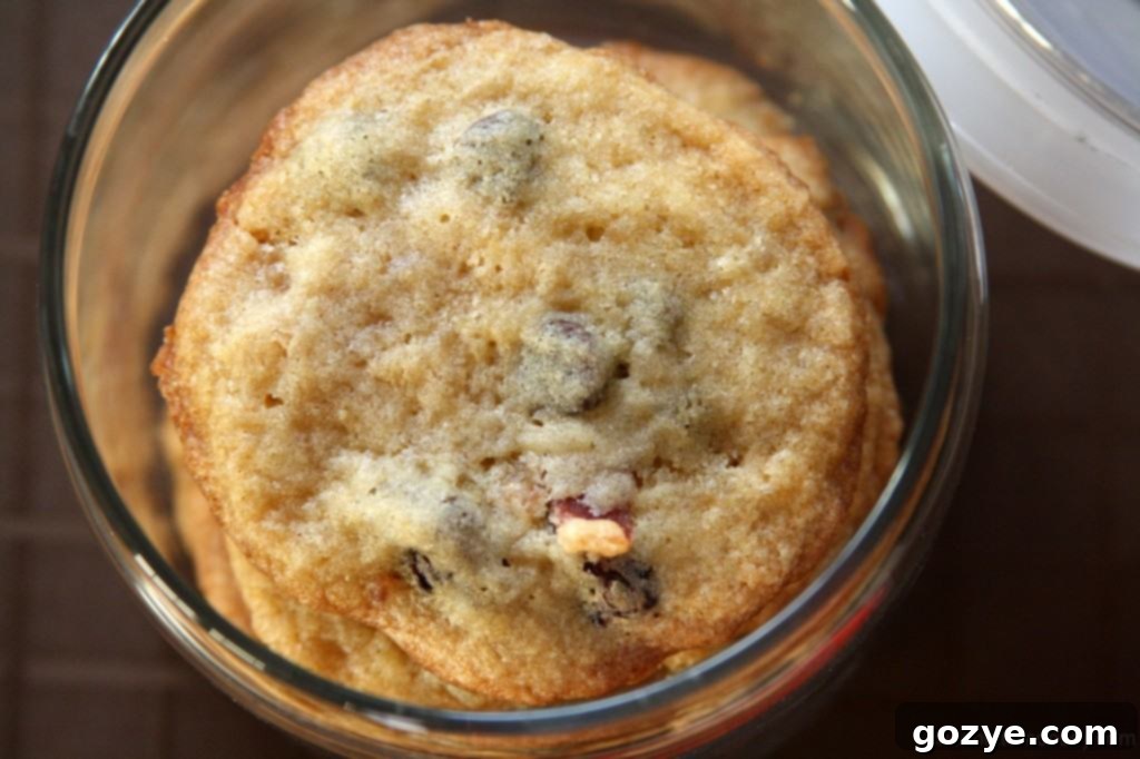 Several Bacon and Dried Cherry Chocolate Chip Cookies arranged on a serving plate