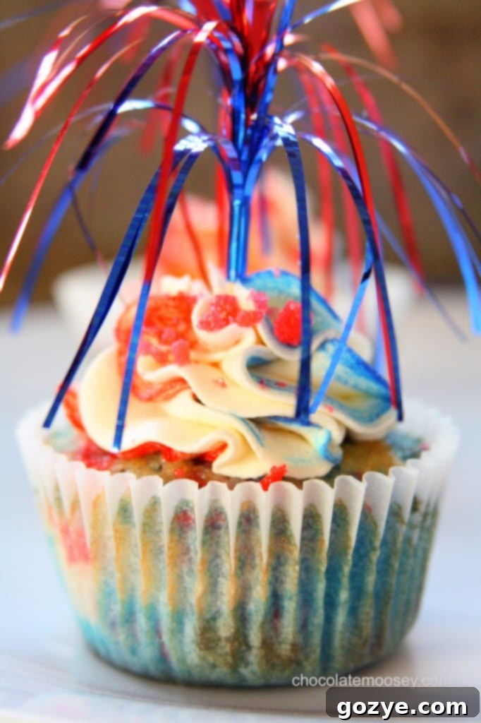 Close-up of the beautiful color-swirled buttercream on top of a Firecracker Cupcake.