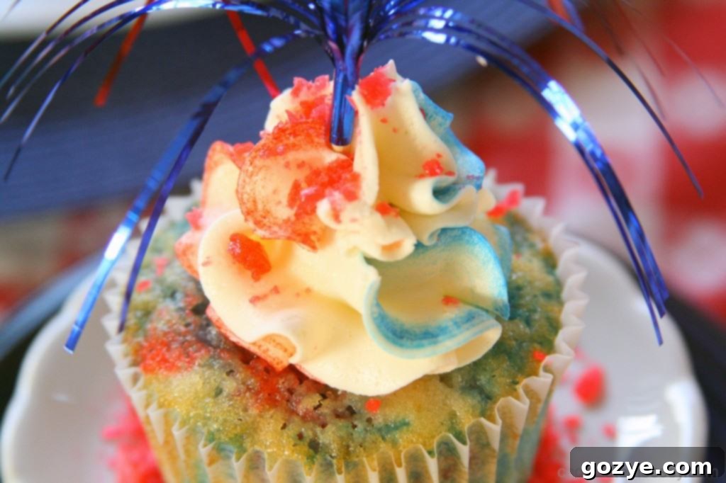 Close-up of a finished Firecracker Cupcake with a generous topping of Pop Rocks.