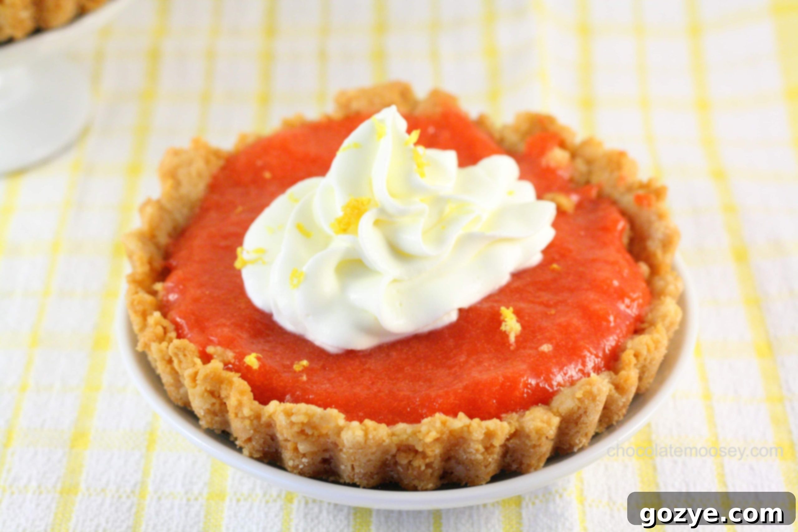 Golden Oreo Cherry Curd Tartlettes with Lemon Whipped Cream, a perfect pie and tart recipe.