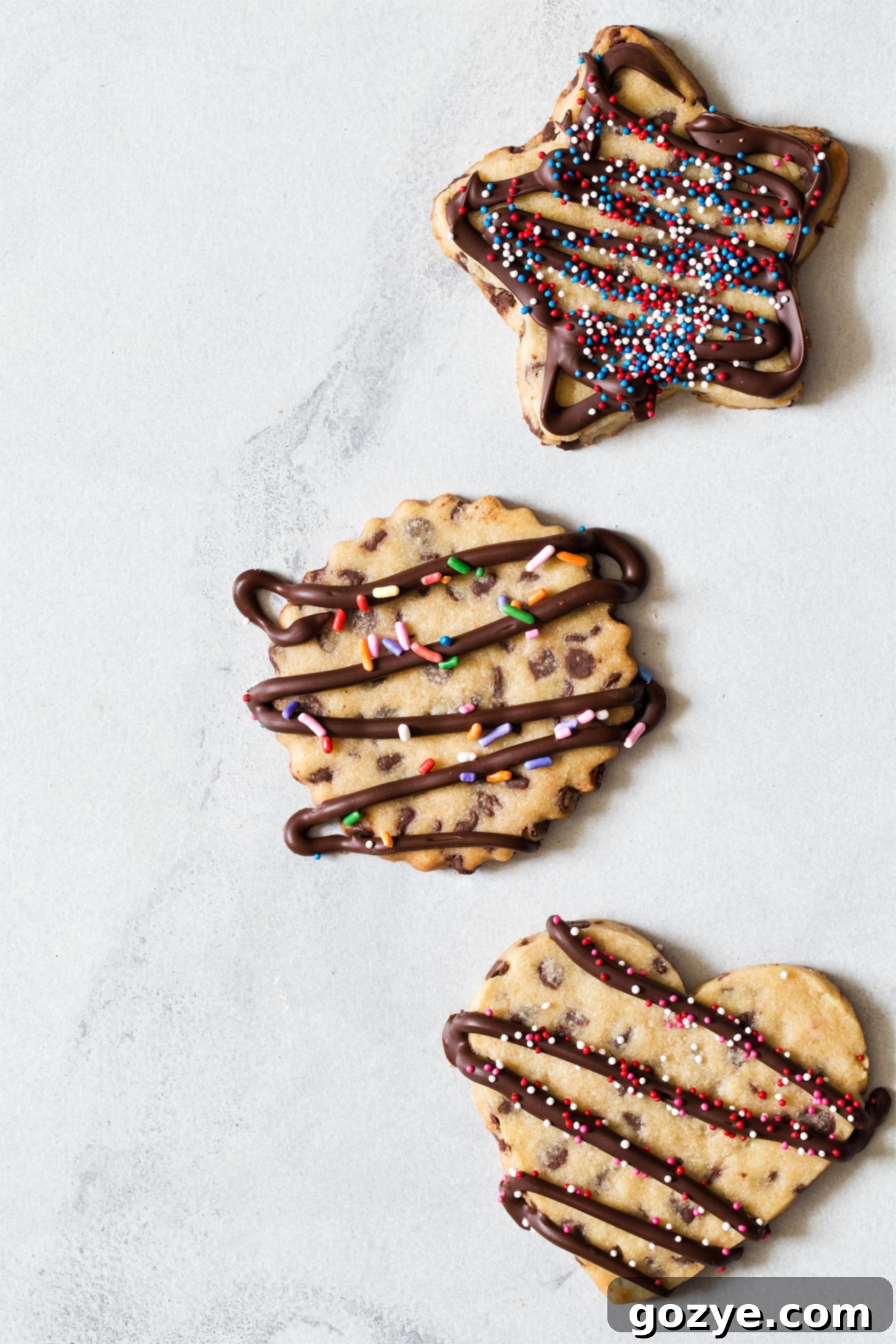 Three chocolate chip cut out cookies