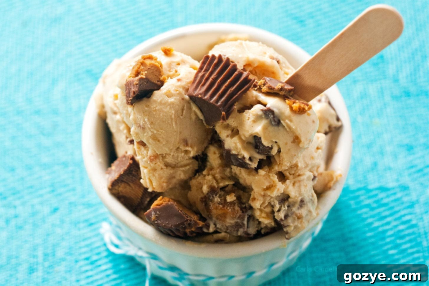 Peanut butter cup ice cream with wooden spoon