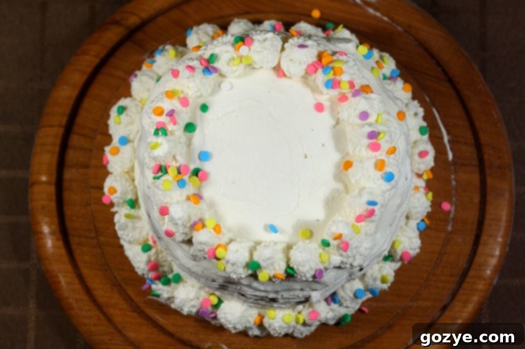 Four perfectly sliced pieces of homemade Copycat Dairy Queen Ice Cream Cake, showing distinct layers and ready to be served