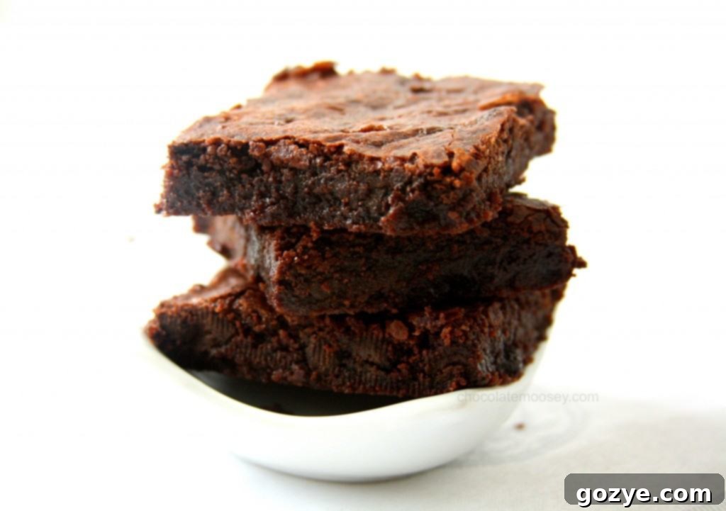 A freshly baked batch of One-Pot Fudgy Raspberry Cocoa Brownies, cooled and ready to slice