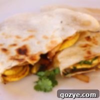 Perfectly cooked Summer Squash and Mushroom Quesadillas, a delightful vegetarian meal.