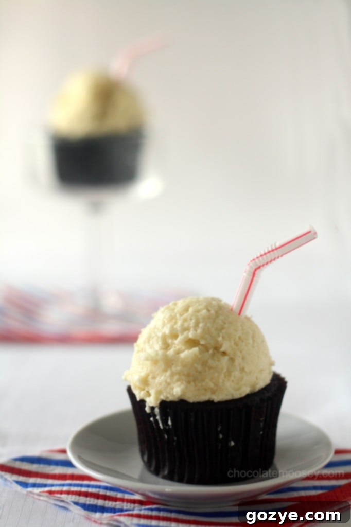Close-up of a Root Beer Float Cupcake, showcasing the 'ice cream' like frosting