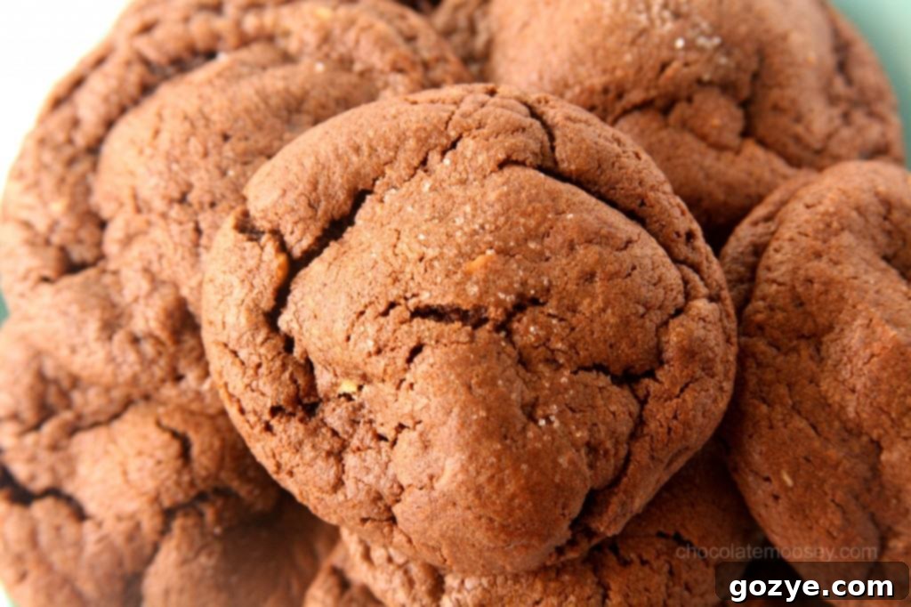 A close-up of the perfectly baked exterior of Peanut Butter-Stuffed Chocolate Cookies