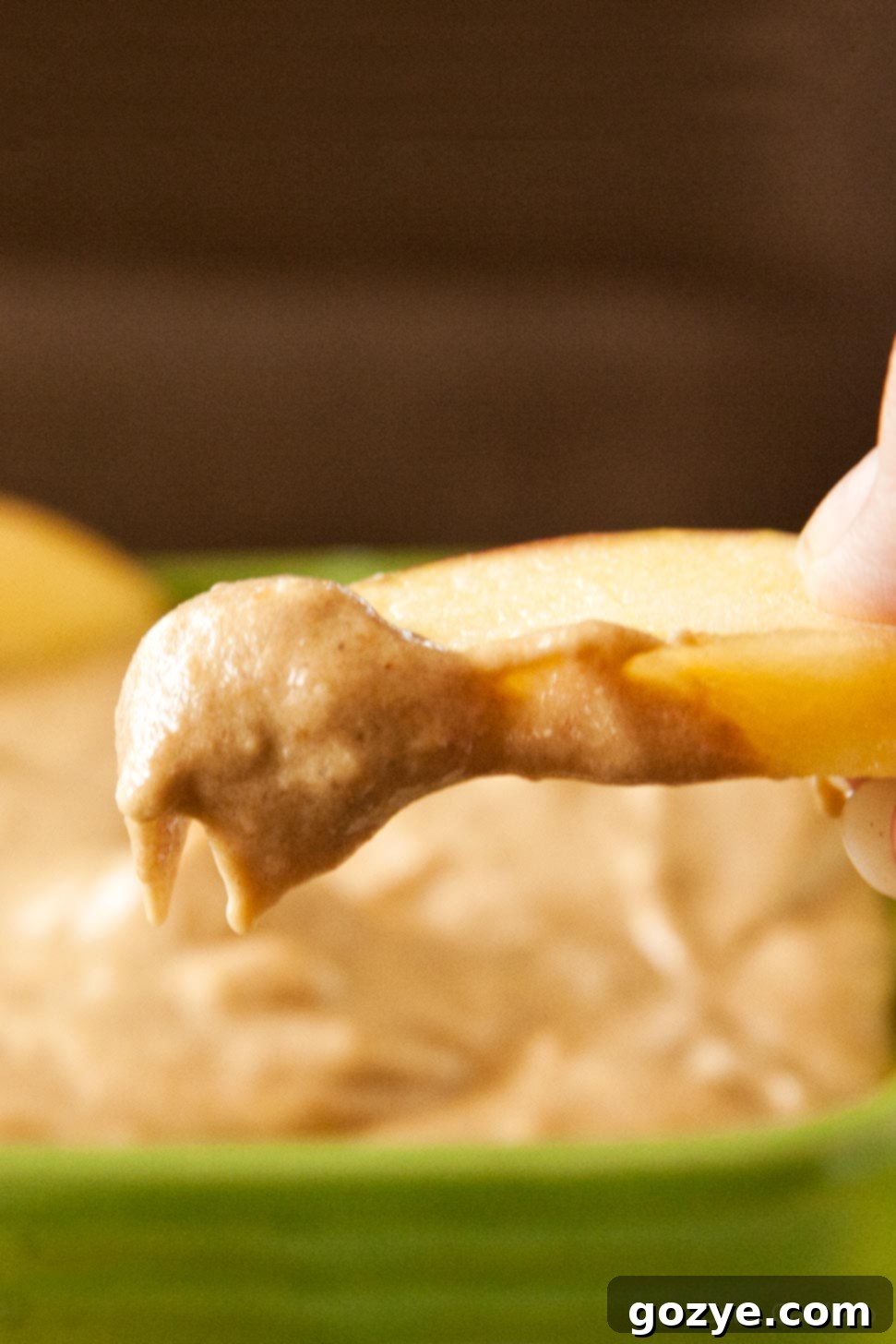 Dippable Caramel Apple Cheesecake 3 Fresh apple slice dipped into the creamy caramel apple cheesecake dip