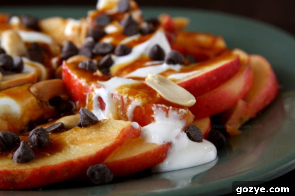 Choose your favorite caramel for these Apple Nachos Homemade caramel sauce drizzled over Apple Nachos