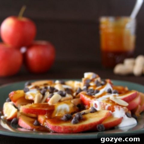Loaded Apple Slices 2 Apple Nachos with caramel, marshmallow fluff, chocolate, and peanuts