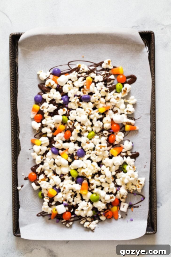 Making Halloween popcorn with candy corn