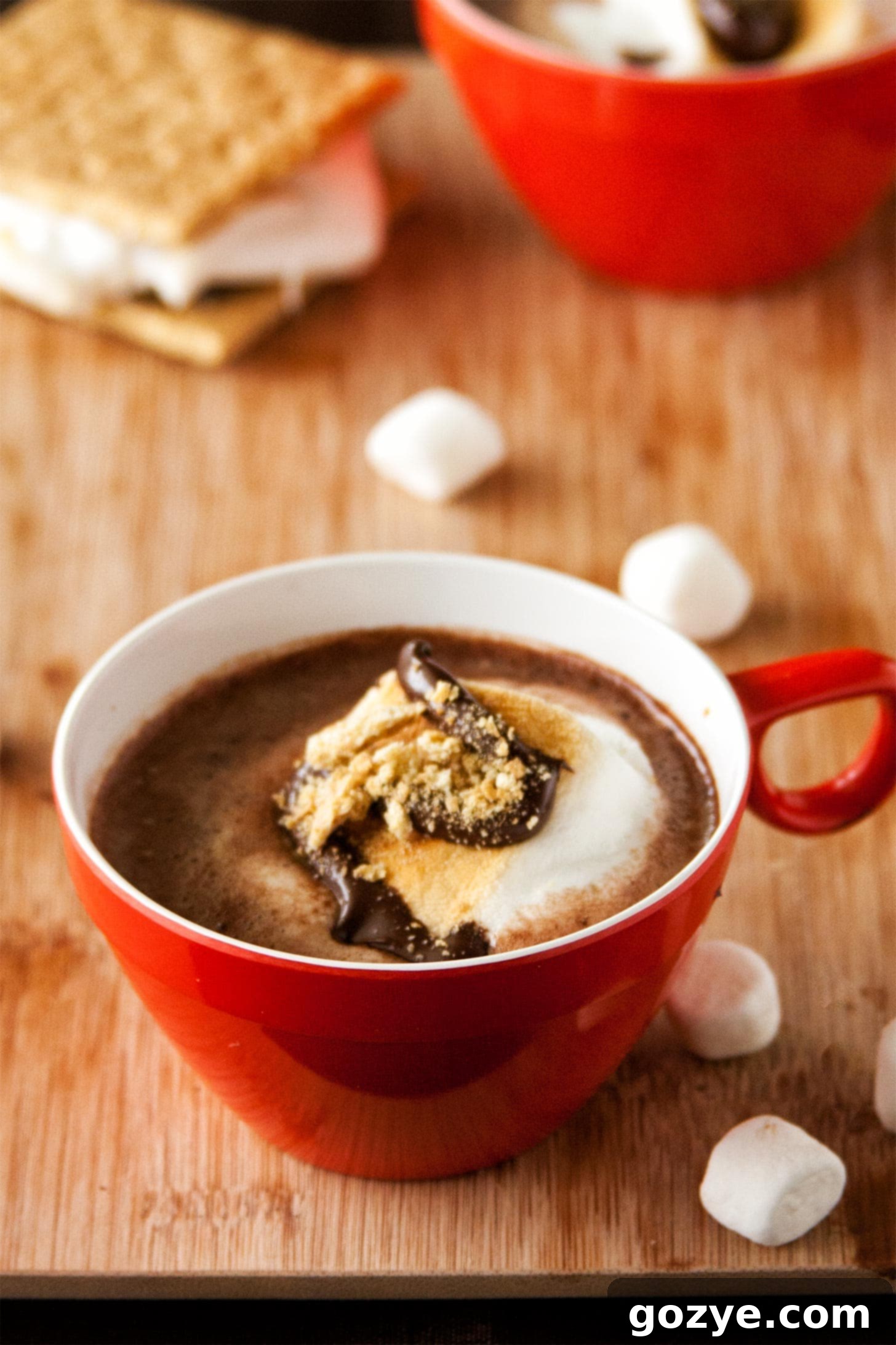 S'mores Hot Chocolate 3 Smores cocoa in a red cup, seen from the side