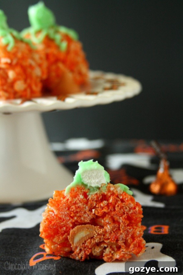Pumpkin Rice Krispie Treat cut in half