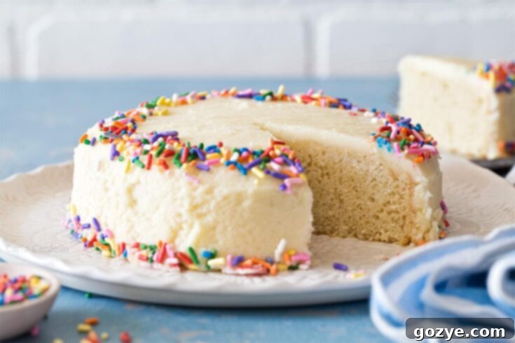A delicious small vanilla cake with creamy buttercream frosting, perfect for any celebration.