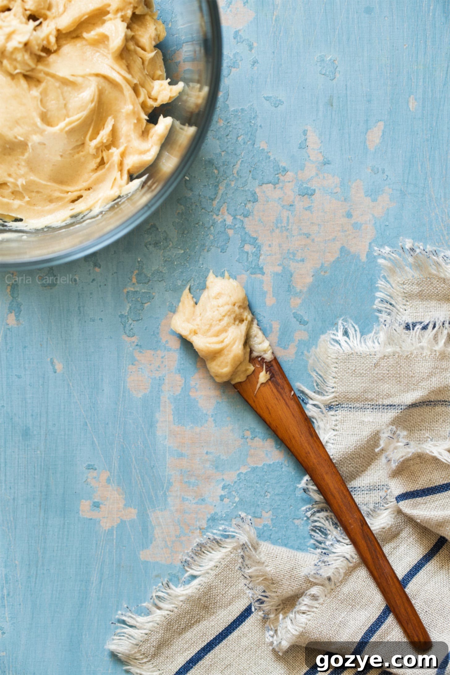 Knife with peanut butter cream cheese frosting