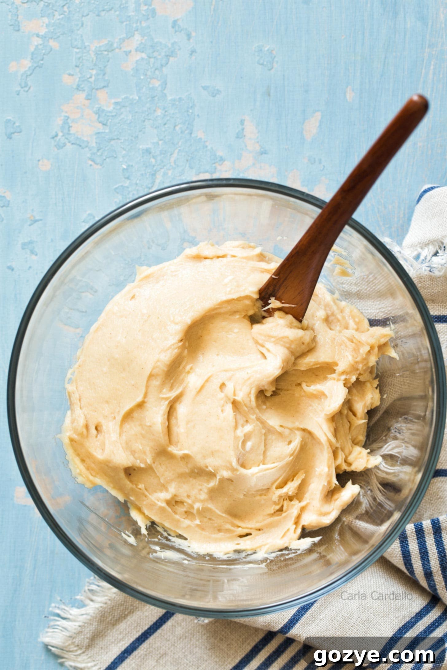 Glass bowl with peanut butter cream cheese frosting