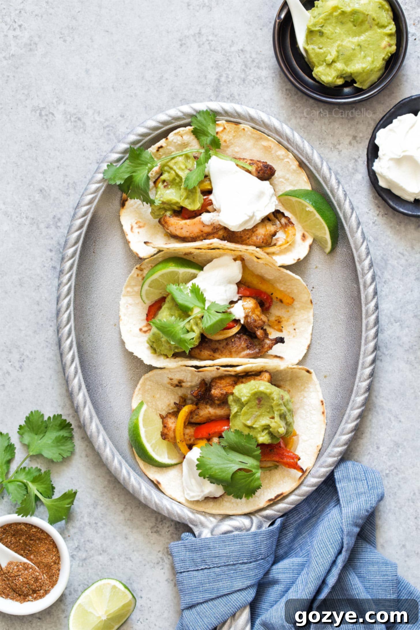 Chicken Fajitas served in warm corn tortillas with fresh toppings