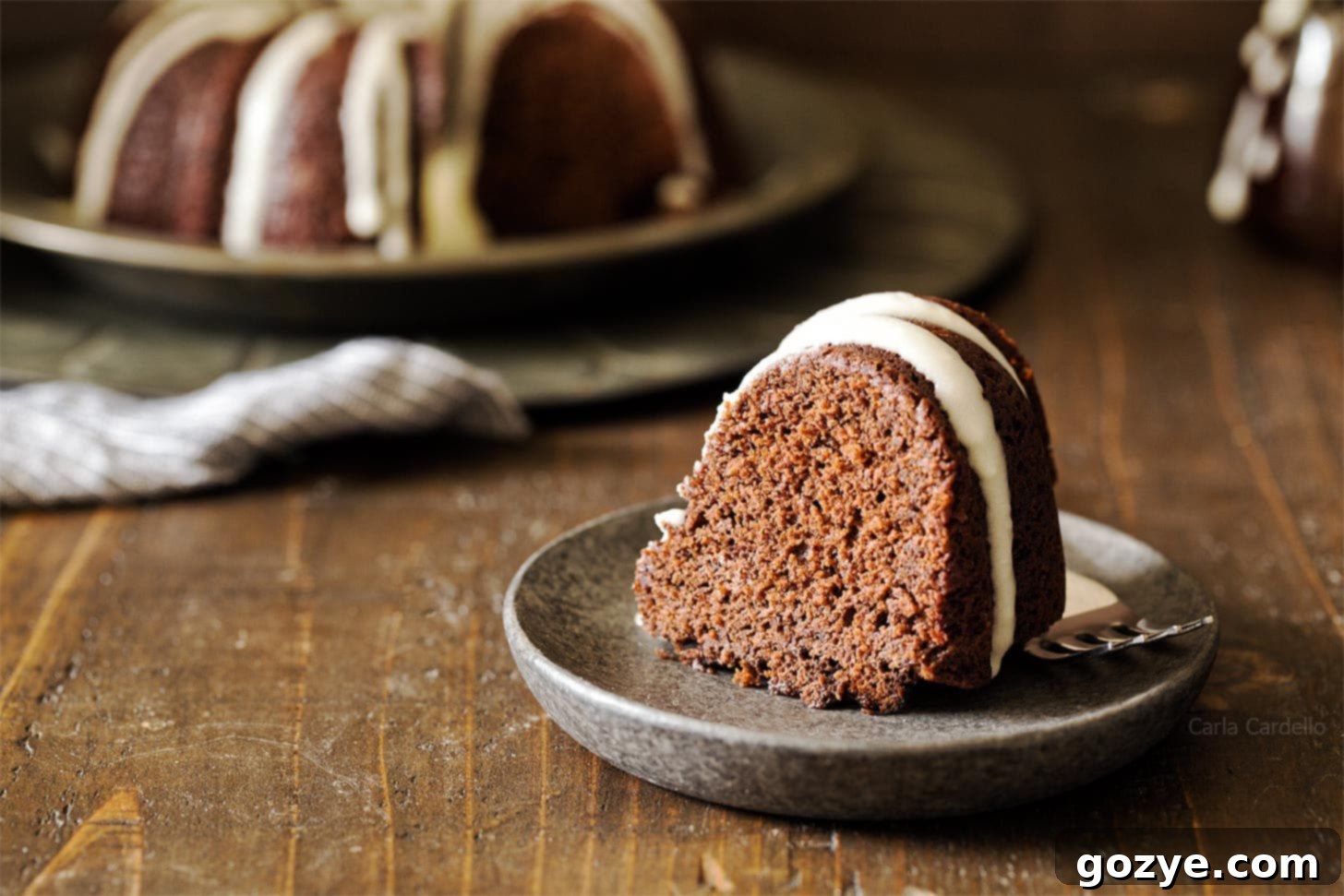 Slice of 6 inch Bundt cake with glaze