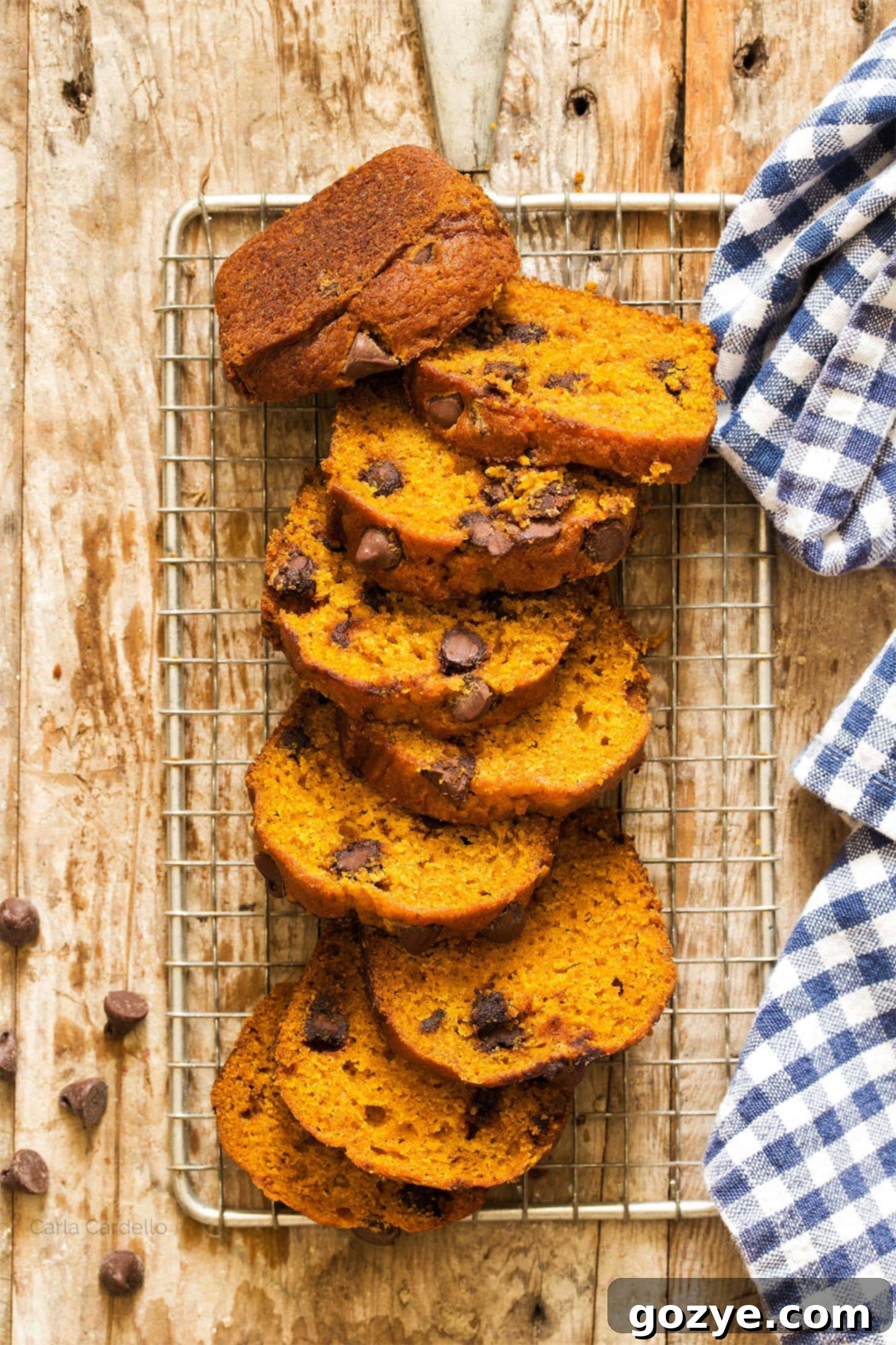Pumpkin Bread Mini Loaves cut into slices, showcasing the chocolate chips and moist texture.